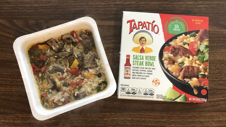 Tapatio salsa verde steak bowl dinner in microwave tray.