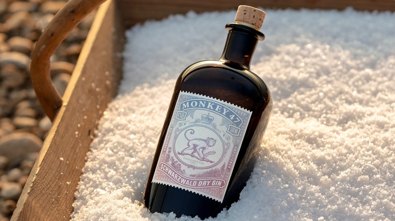 Monkey 47 Schwarzwald Dry Distiller's Cut gin bottle in salt inside a wooden crate