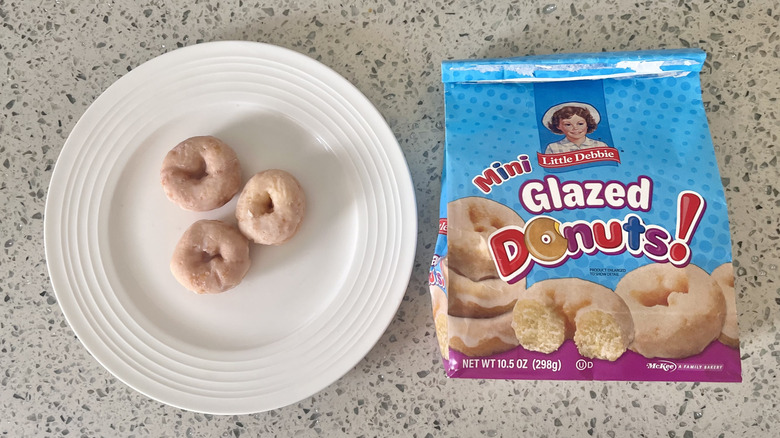 Little Debbie glazed mini donuts on a white plate