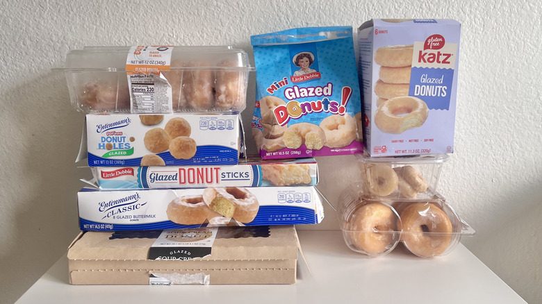 Various glazed donuts on a table
