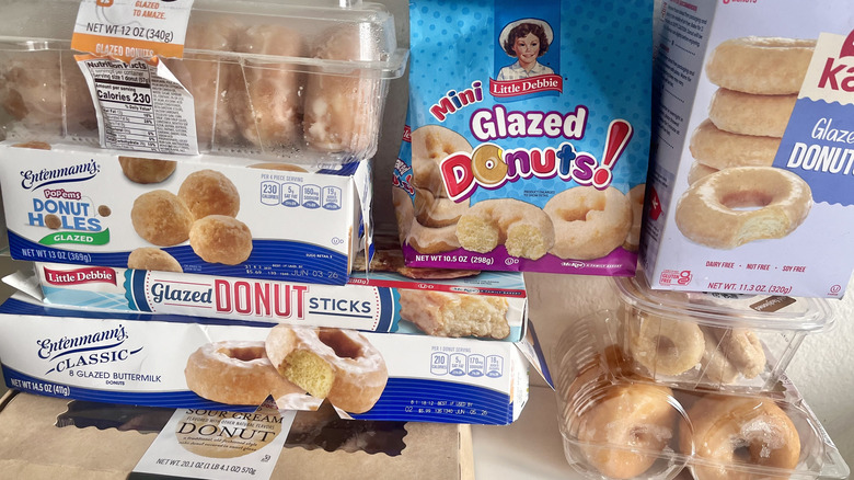 Close up of different glazed donuts on a table