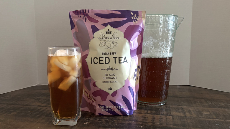 Harney & Sons Black Currant iced tea in package, glass, and pitcher.