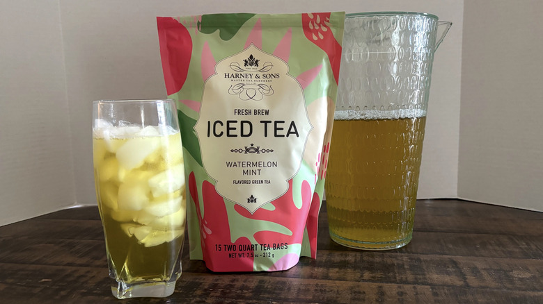 Harney & Sons Watermelon Mint iced tea in package, glass, and pitcher.
