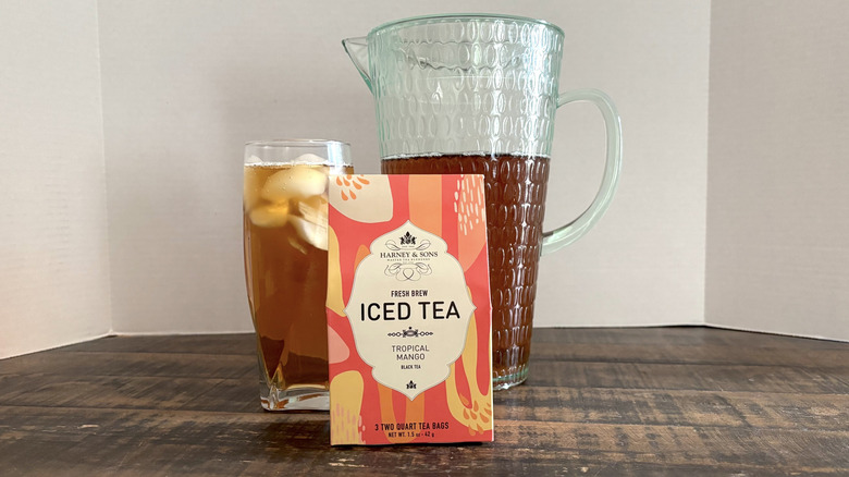 Harney & Sons Tropical Mango iced tea in package, glass, and pitcher.