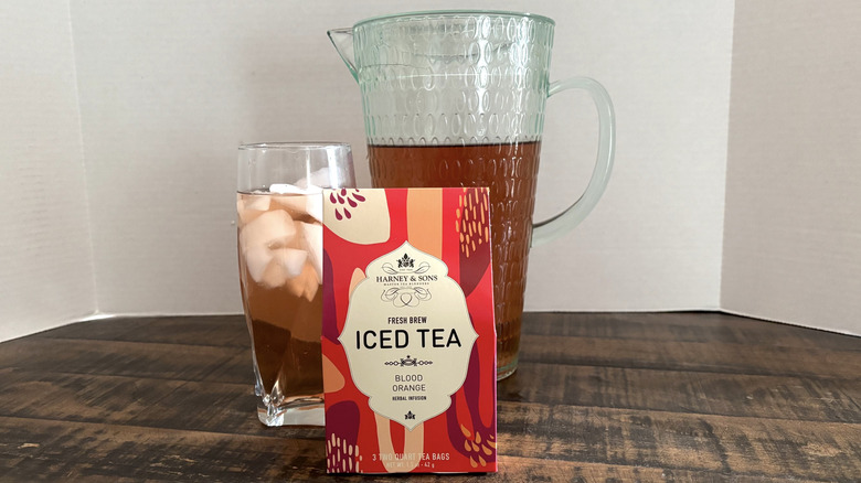 Harney & Sons Blood Orange iced tea in package, glass, and pitcher.