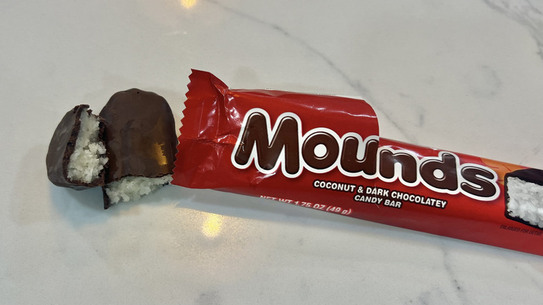 Mounds coconut and chocolate bar split in half.