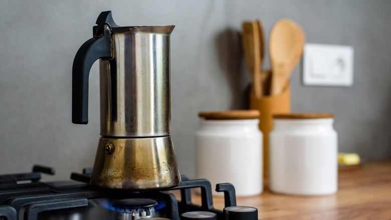 Vintage coffee percolator on stovetop