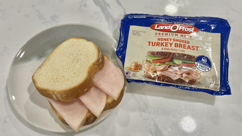 Land O'Frost Honey Smoked Turkey Breast on bread.
