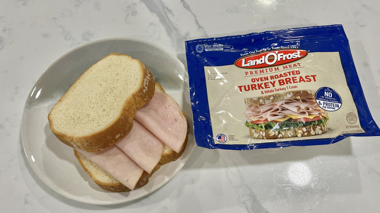 Land O'Frost Oven Roasted Turkey Breast on bread.
