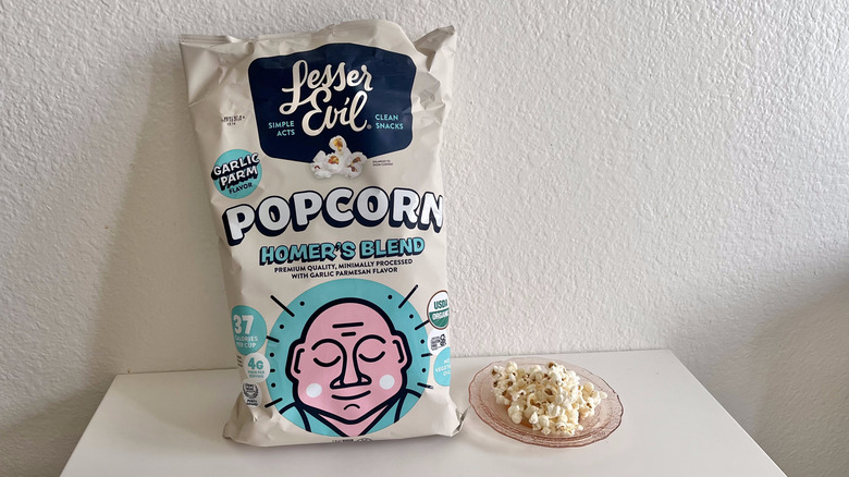 Homer's Blend bag on a table with popcorn on a plate