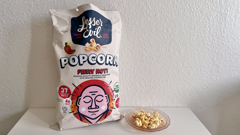 Fiery Hot bag with some popcorn on a plate