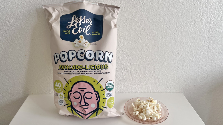 Bag of Avocado-licious with some popcorn on a plate