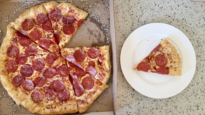 Stuffed Crazy Crust Pepperoni pizza slice on a plate