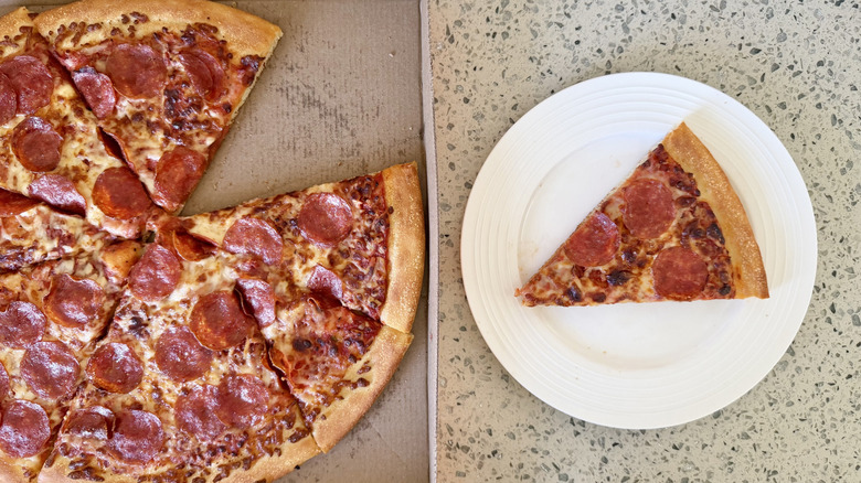 Slice of Large Classic Pepperoni placed on a plate