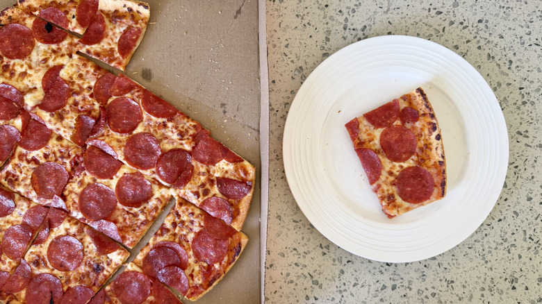 Thin Crust Pepperoni piece on a plate