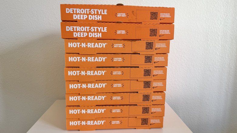 Stacked boxes of Little Caesars pizzas