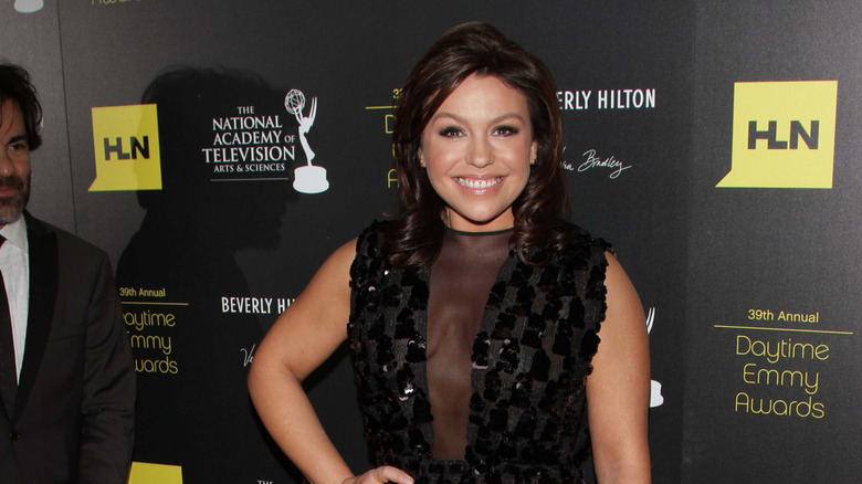 Rachael Ray in a black dress at an event