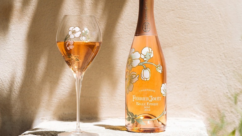 Bottle of Champagne Perrier-Jouët Belle Bpoque Rose and glasses