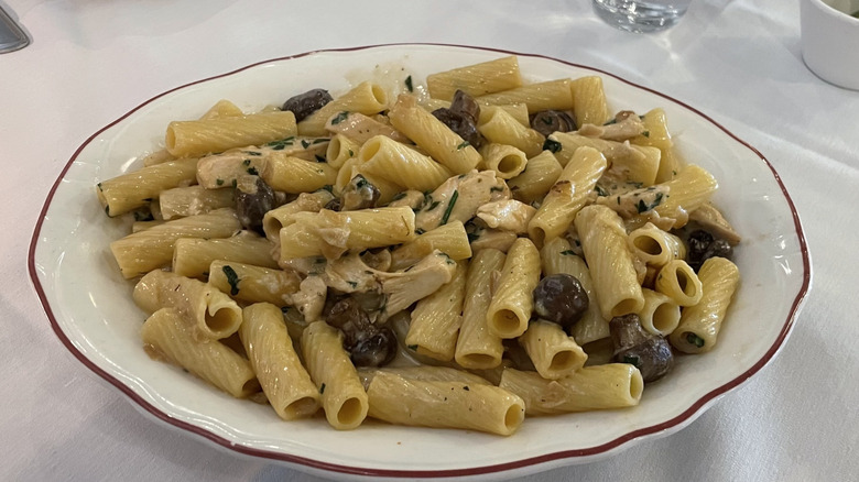 Rigatoni pasta with mushrooms, chicken, and marsala cream sauce