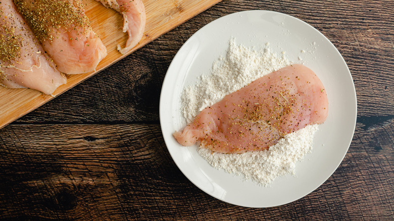 chicken in flour on plate