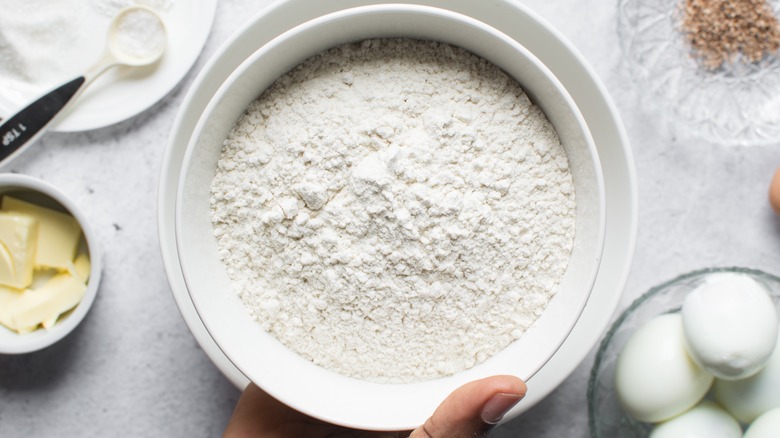 All-purpose flour in white bowl on countertop