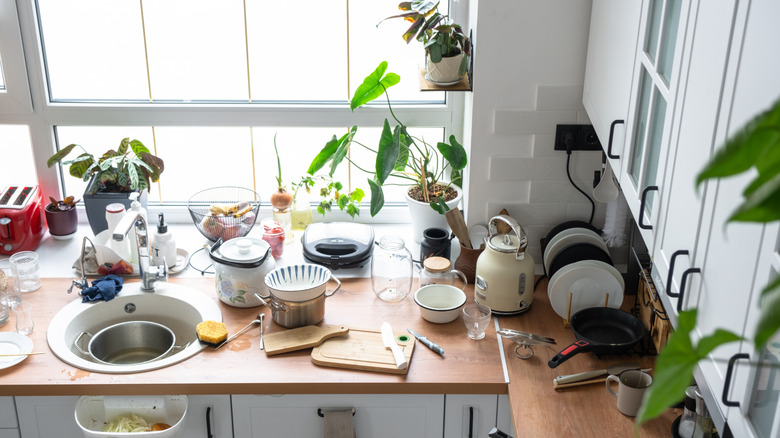 Messy modern kitchen after cooking