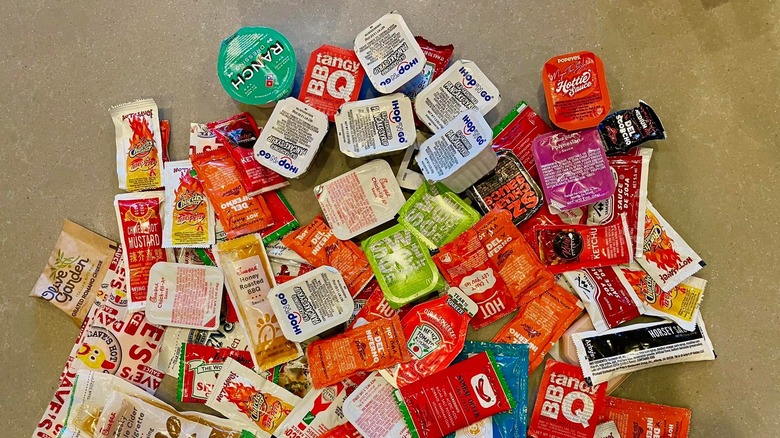 Condiment packets in a pile