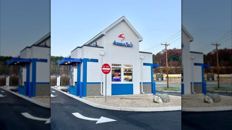Exterior of Aroma Joe's location with drive-thru visible in New Hampshire