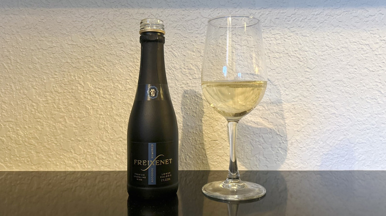 A bottle and glass of Freixenet Alcohol-Removed Sparkling White Wine