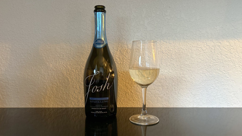 A bottle and glass of Josh Cellars Non-Alcoholic Sparkling
