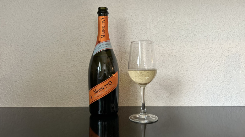 A bottle and glass of Mionetto Alcohol-Removed Sparkling Wine