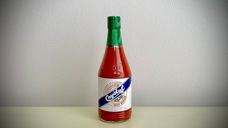 An unopened bottle of Crystal Hot Sauce