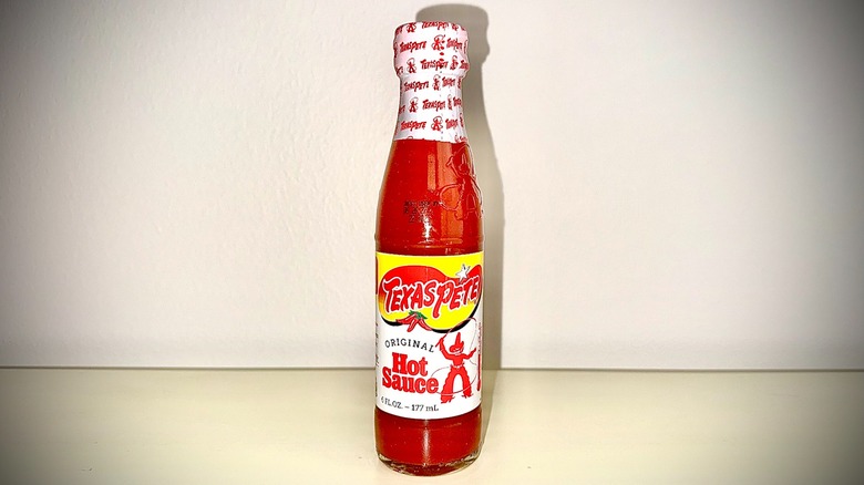 An unopened bottle of Texas Pete Hot Sauce