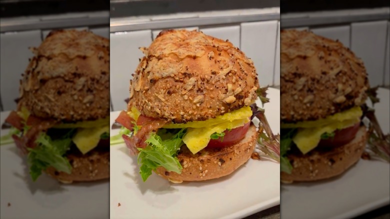 Panera Wake-Up BLT Asiago Everything Bagel sandwich on white plate
