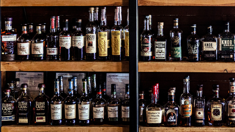 Rows of bottles of bourbon