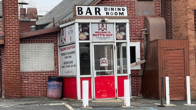 Entrance to Rutt's Hut on brick building