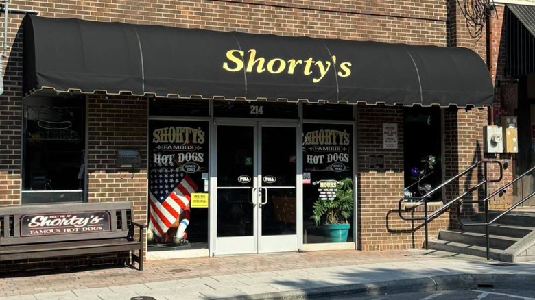 Shorty's extreior brick building with black awning