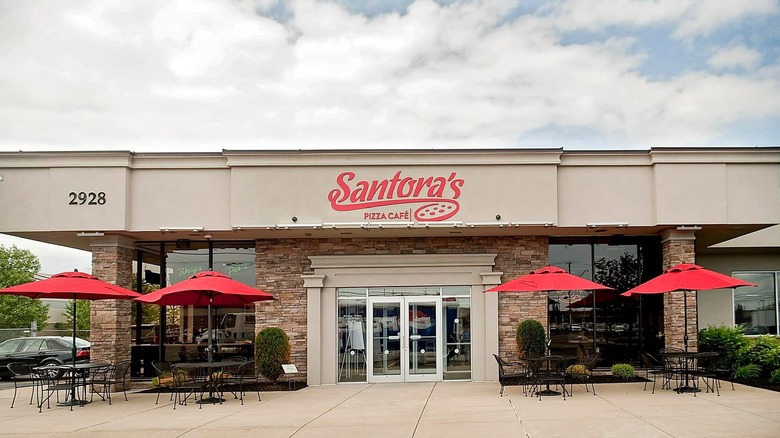 Santora's Pizza storefront with outdoor seating