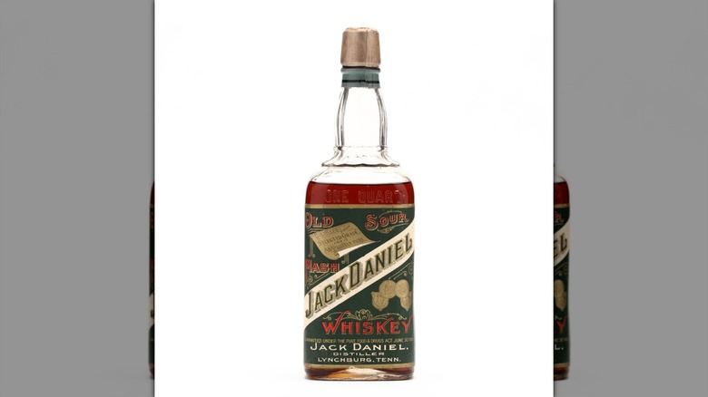 a bottle of Jack Daniel's 1912 Old Sour Mash Whiskey on a white background