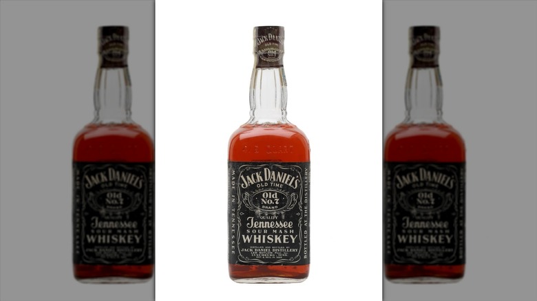 a bottle of Jack Daniel's 1955 Old No. 7 on a white background