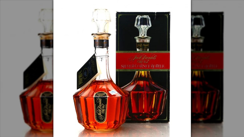 a bottle of Jack Daniel's Silver Cornet with its box on a white background