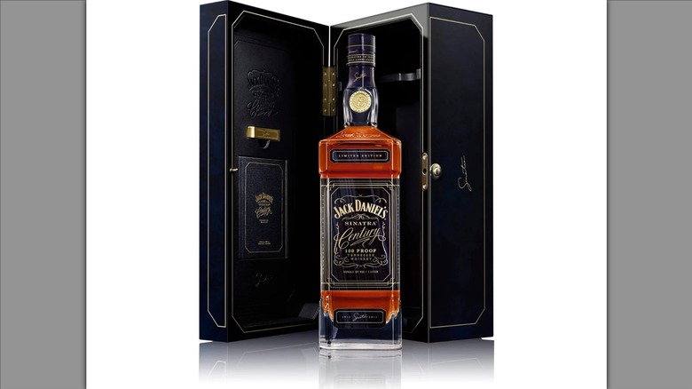 a bottle of Jack Daniel's Sinatra Century Whiskey with its case on a white background