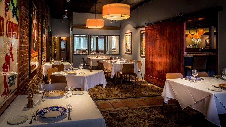 Interior view of Barolo Grill with set tables