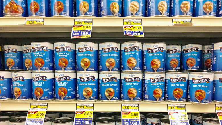 Several cans of Progresso soup including chicken pot pie