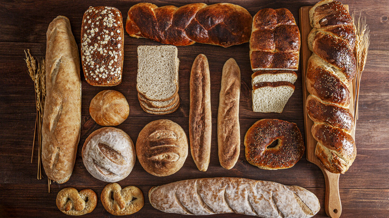 Assortment of bread on rustic wooden table