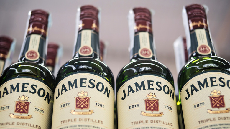 A row of Jameson whiskey bottles