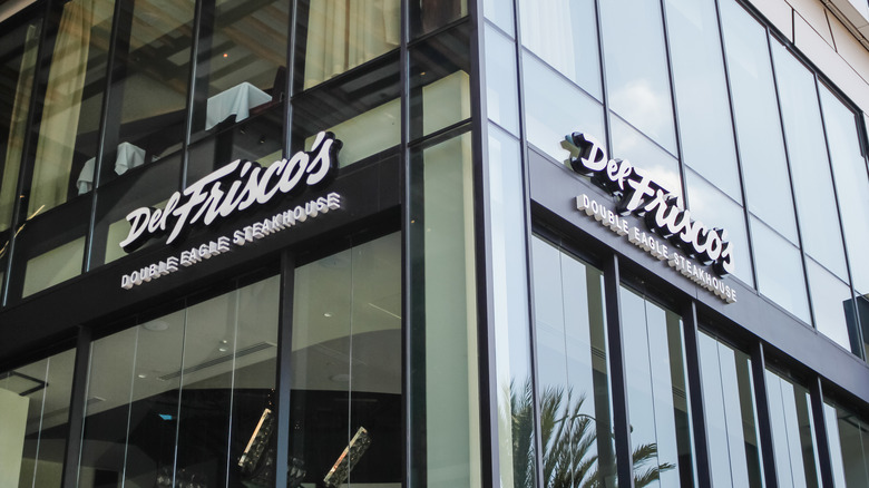 Exterior view showing two signs for Del Frisco's