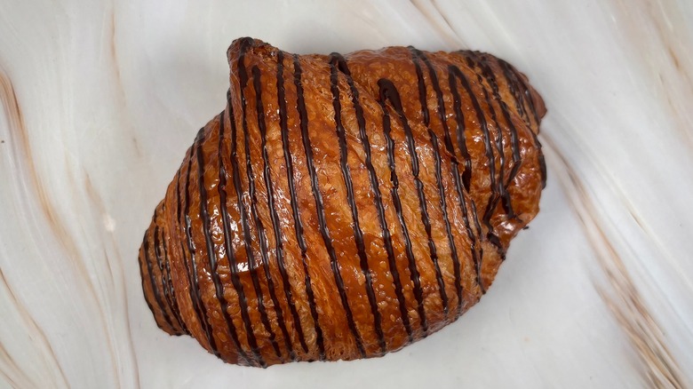 Top-down shot of chocolate croissant from Paris Baguette
