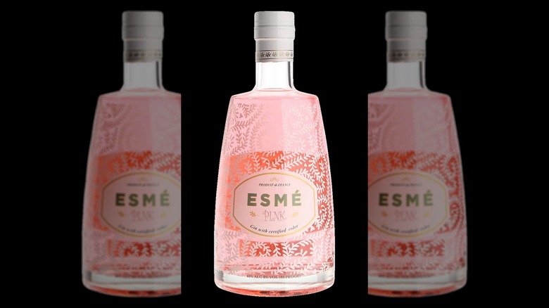 A simple product shot of Esme Pink Gin on a plain black background