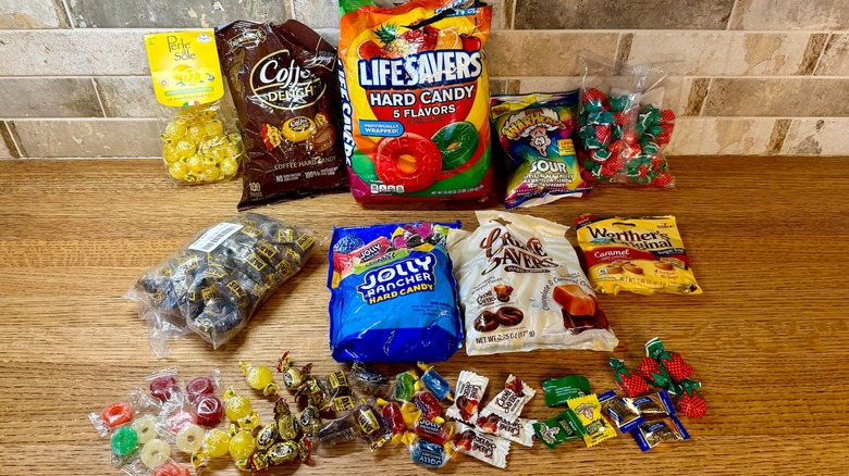 multiple bags of hard candy with the pre-packaged bite sized pieces laying in front